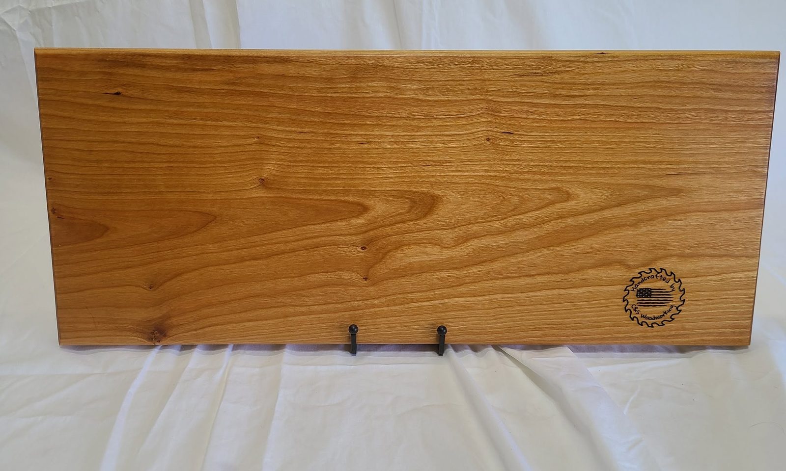 Cherry board with our burned logo